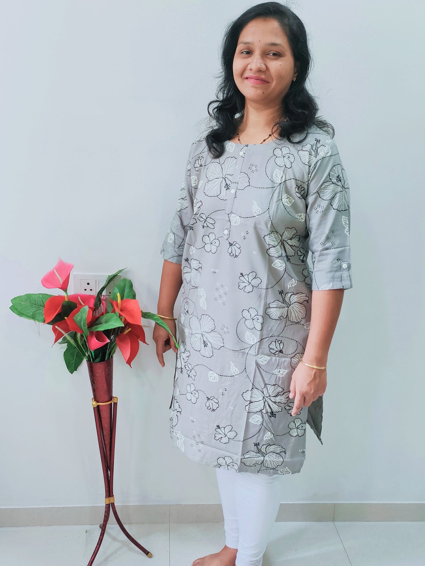 Stylish grey kurti with side pocket featuring floral patterns, ideal for casual wear