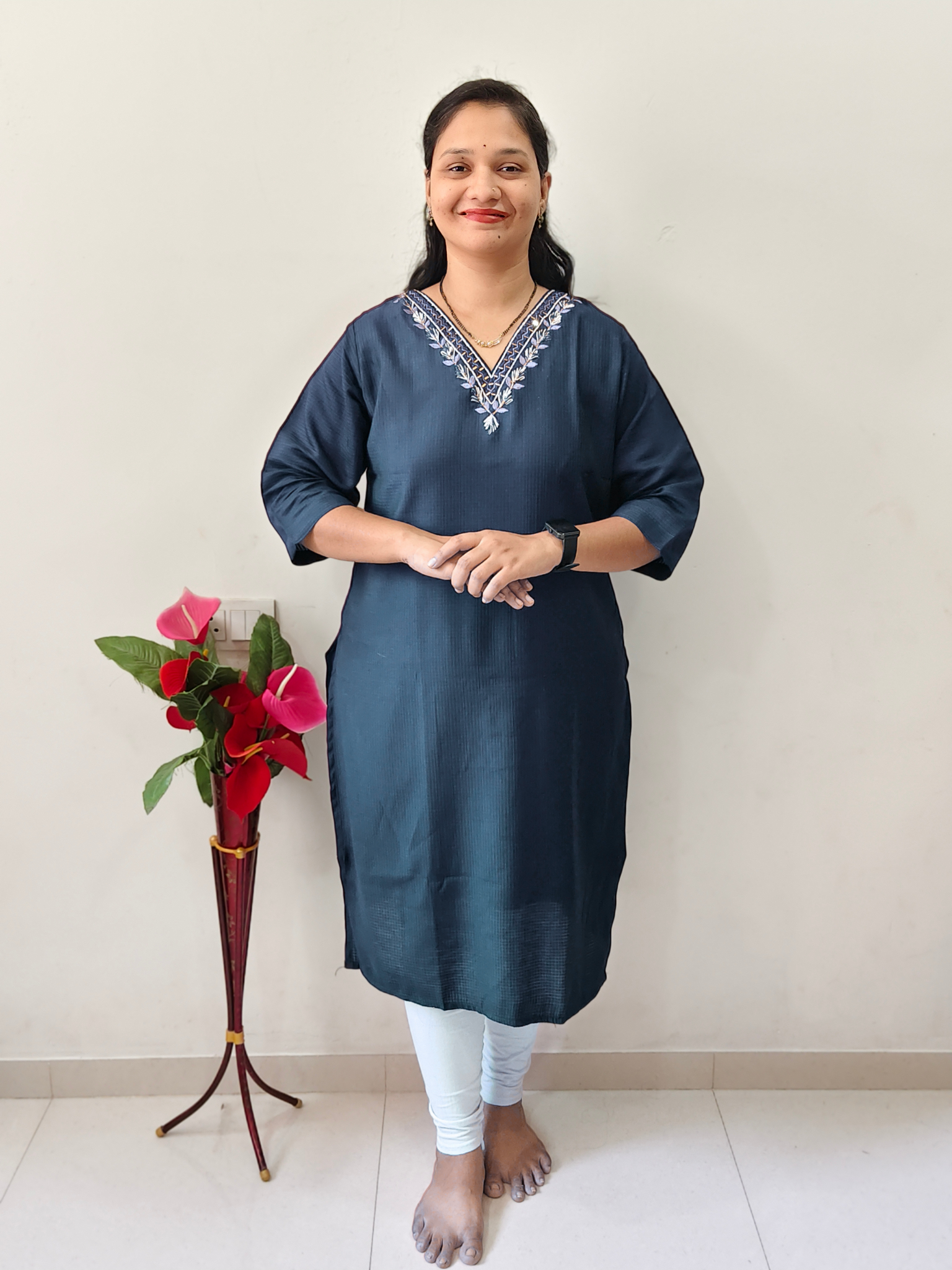 Elegant petrol blue designer kurti with embroidered neckline, perfect for casual and festive occasions