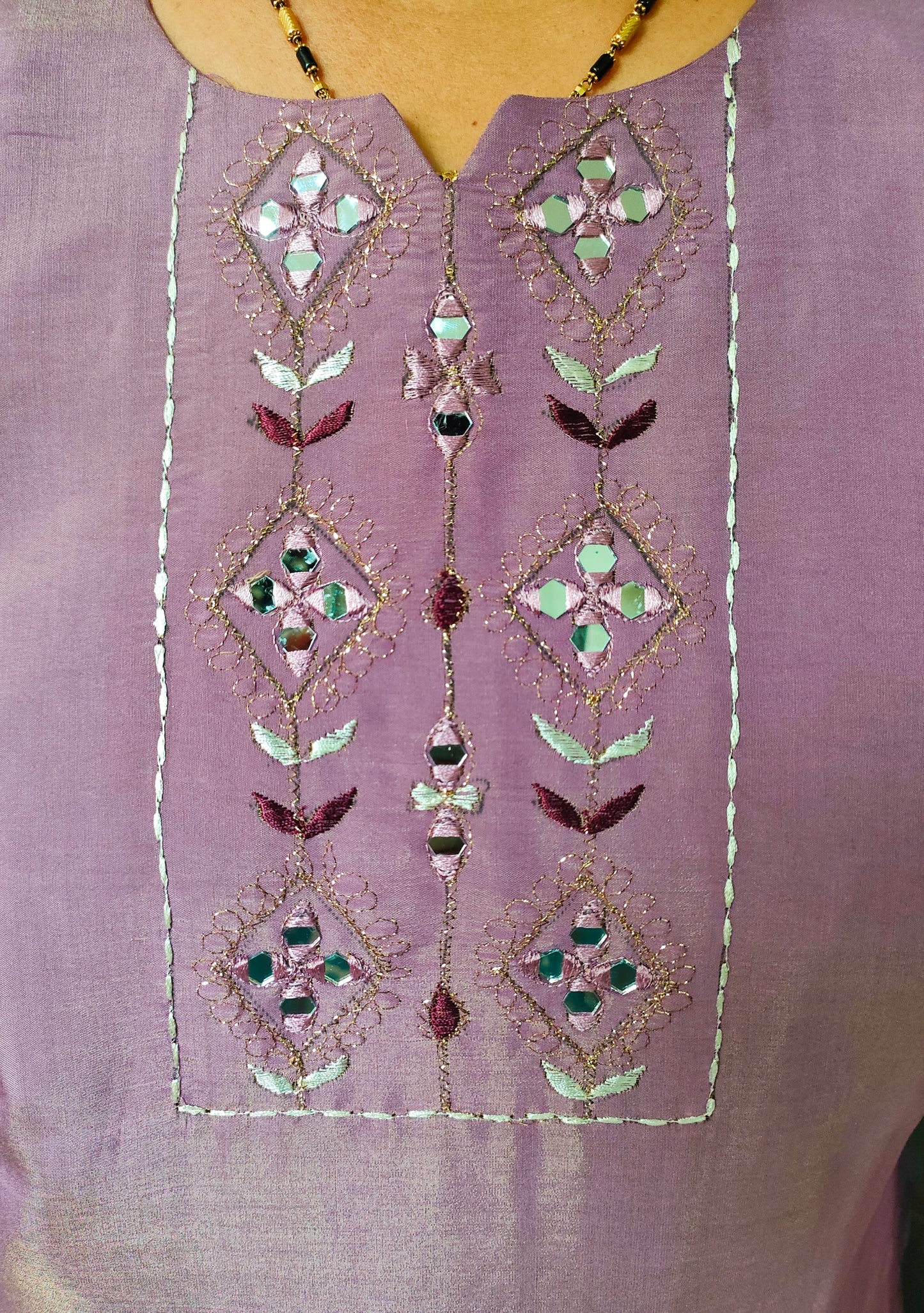 Elegant Plus Size Cotton Silk Kurti with Intricate Embroidery and Decorative Elements