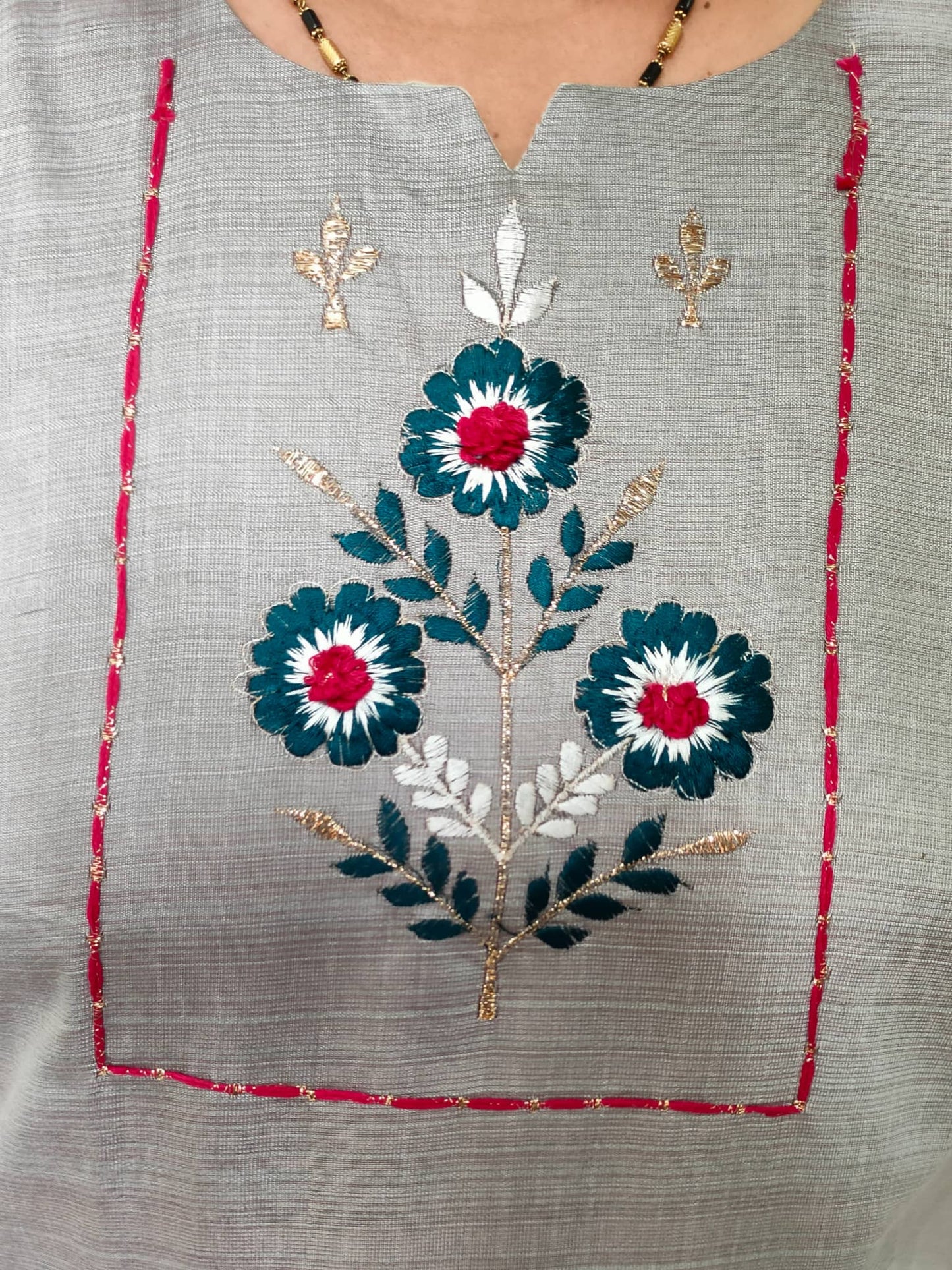 Plus size grey cotton silk kurti featuring floral embroidery for a stylish look