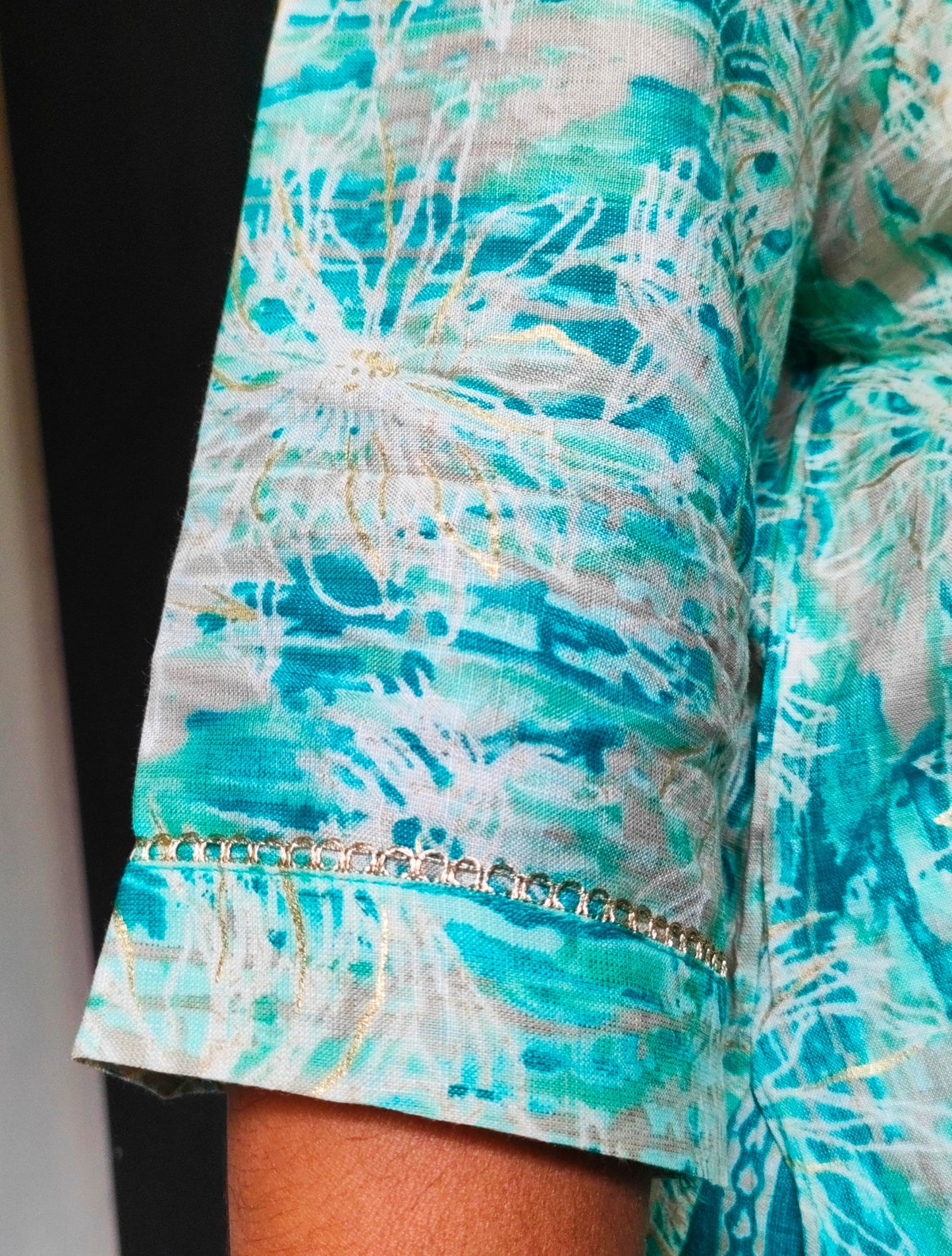 Close-up of plus size rayon kurti set sleeve featuring intricate design and elegant detailing