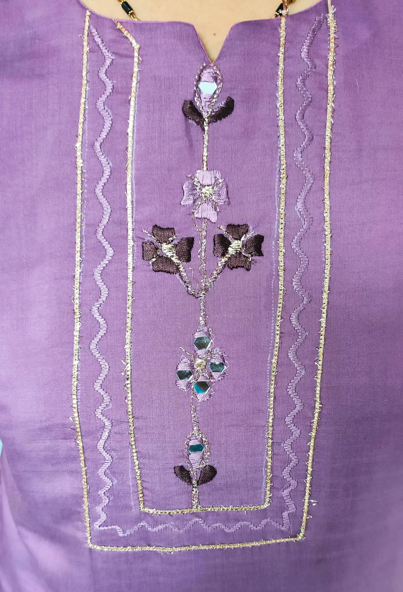 Elegant Collections premium cotton silk kurti in purple with intricate floral embroidery and sequins