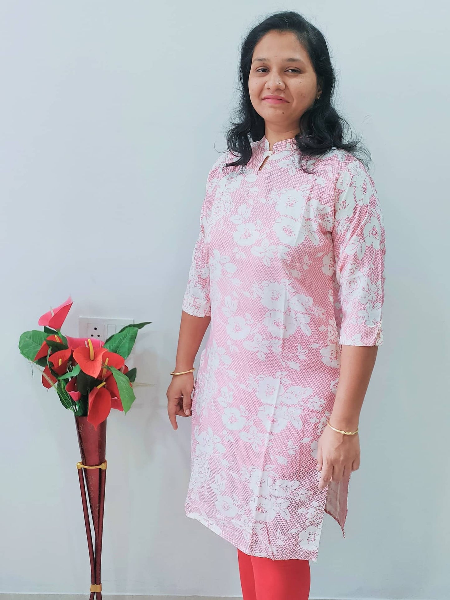 Elegant pink premium rayon kurti with floral print, perfect for casual or festive occasions