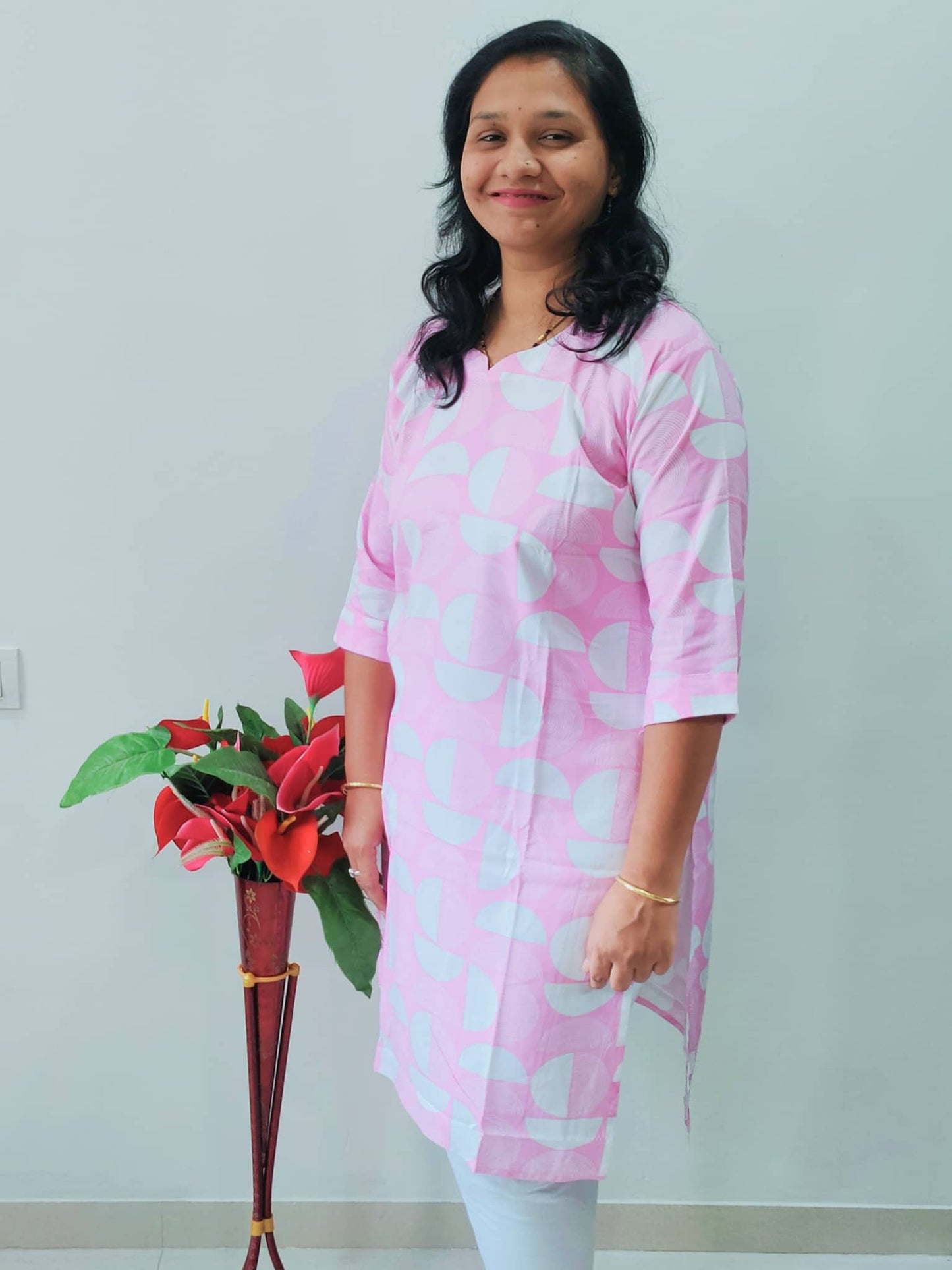 Elegant premium rayon kurti in pink with modern geometric patterns, perfect for casual wear