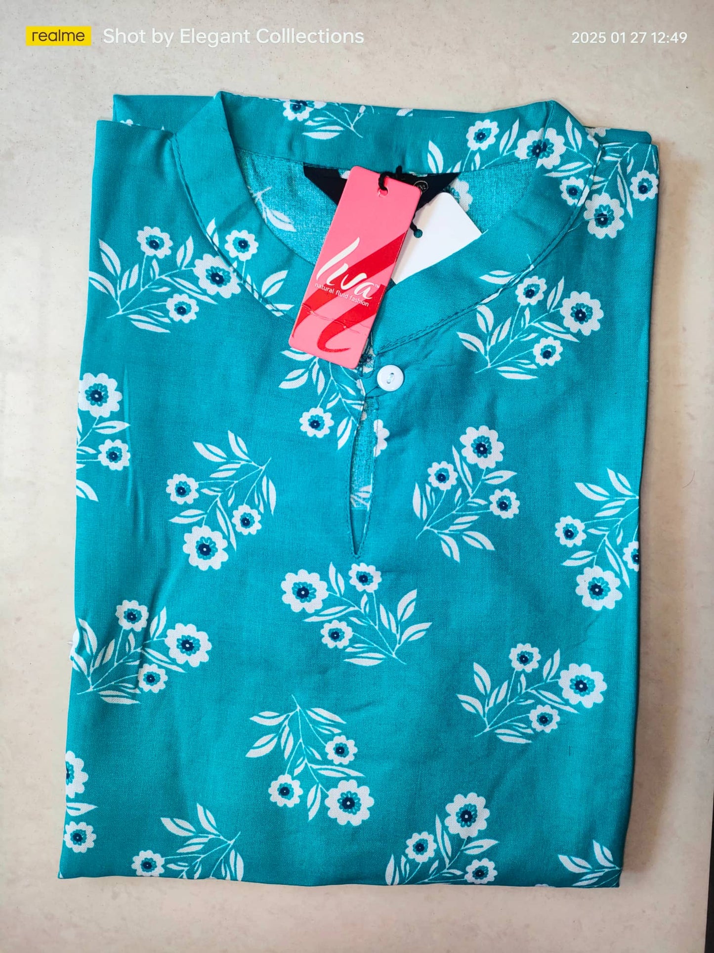 Premium rayon kurti with pocket in teal featuring floral patterns and a classic collar design
