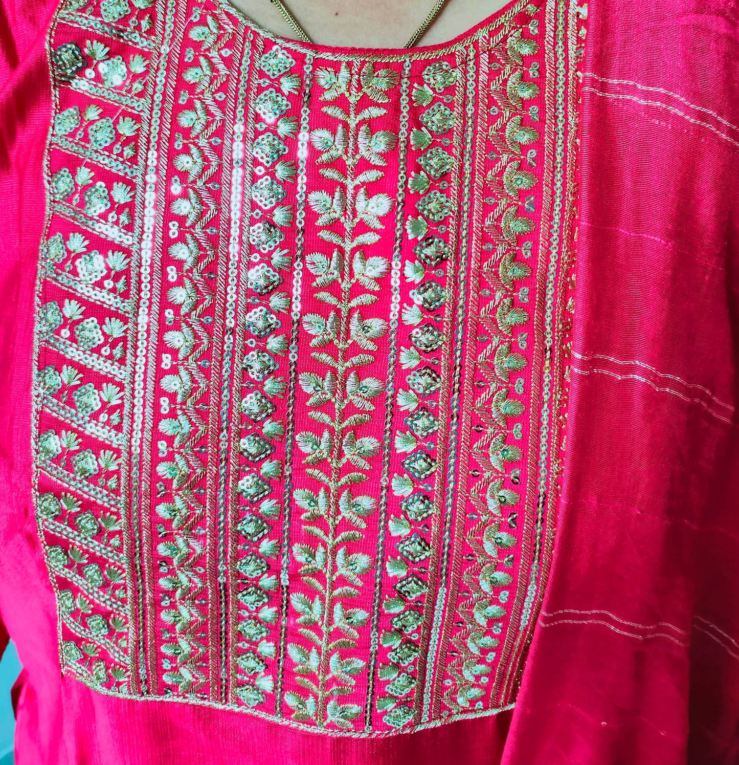 Elegant Premium silk kurti pant set in vibrant pink with intricate gold embroidery detailing