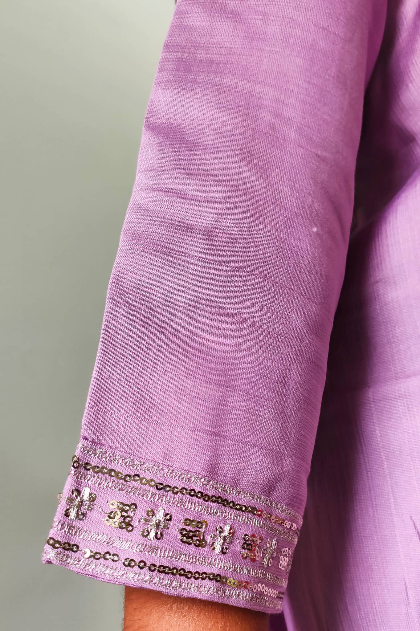 Elegant light purple Premium Silk Kurti Set with intricate silver embroidery on the sleeve cuff