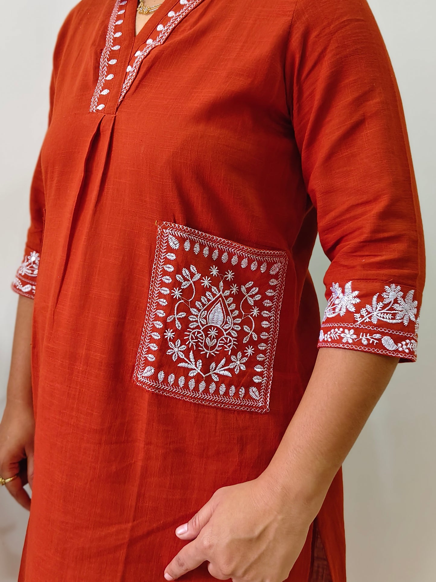 Elegant Collections pure cotton co ord set for women with white floral embroidery on rust orange fabric