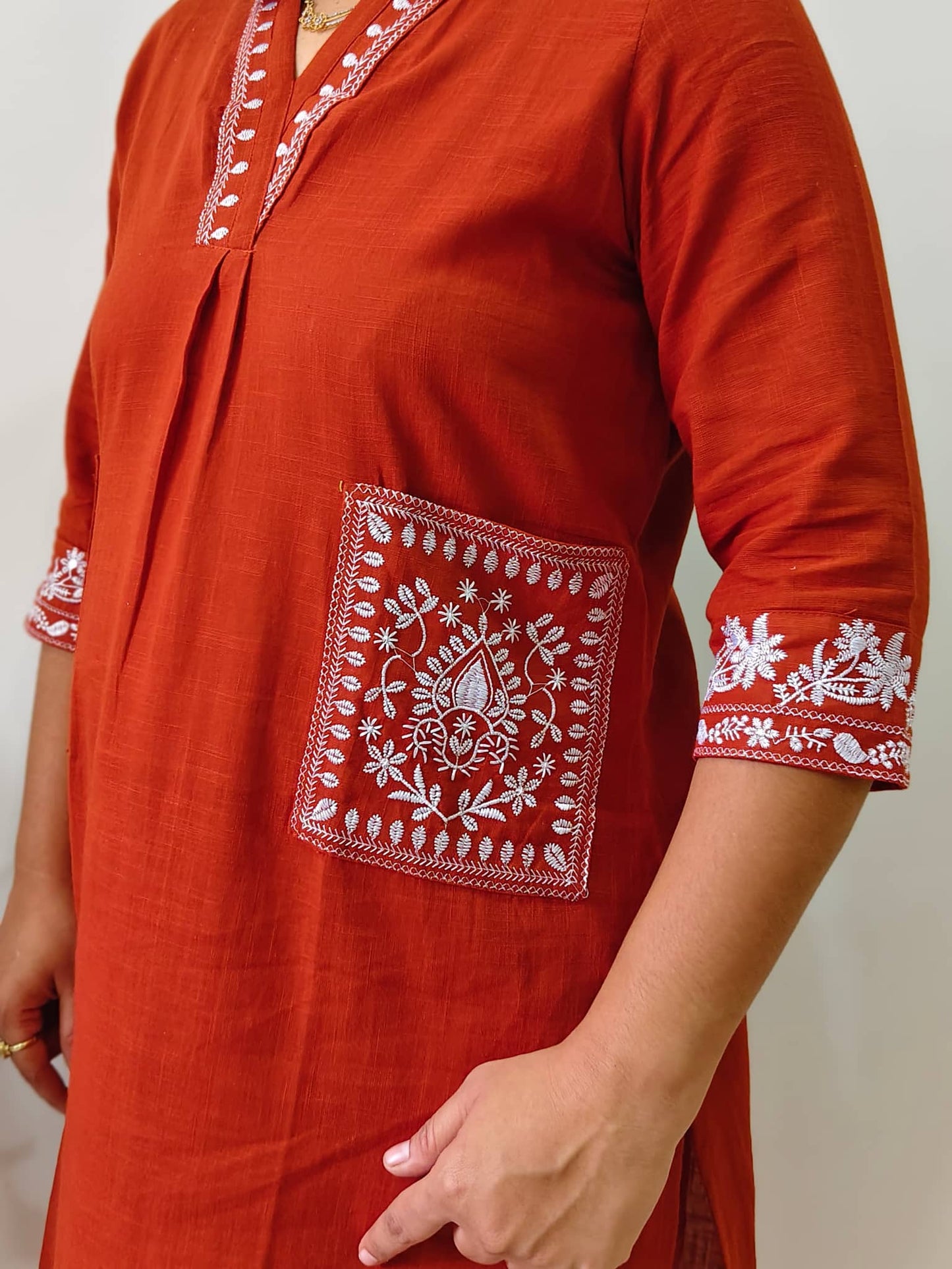 Elegant Collections pure cotton co ord set for women with white floral embroidery on rust orange fabric