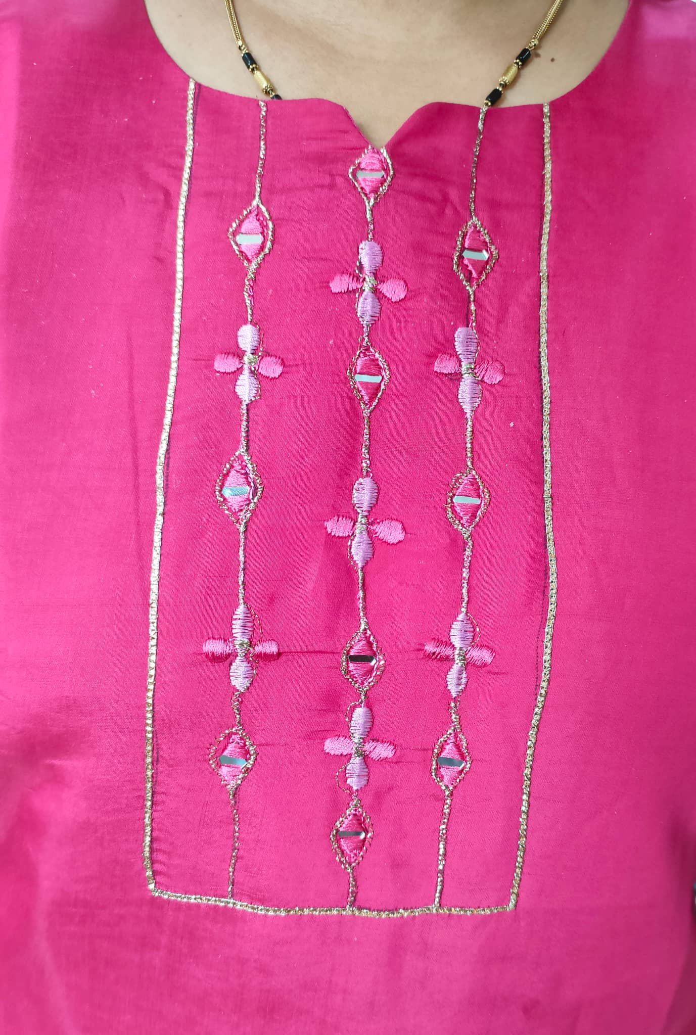 Rani Pink Cotton Silk Kurti featuring intricate embroidery on the neckline for a stylish look