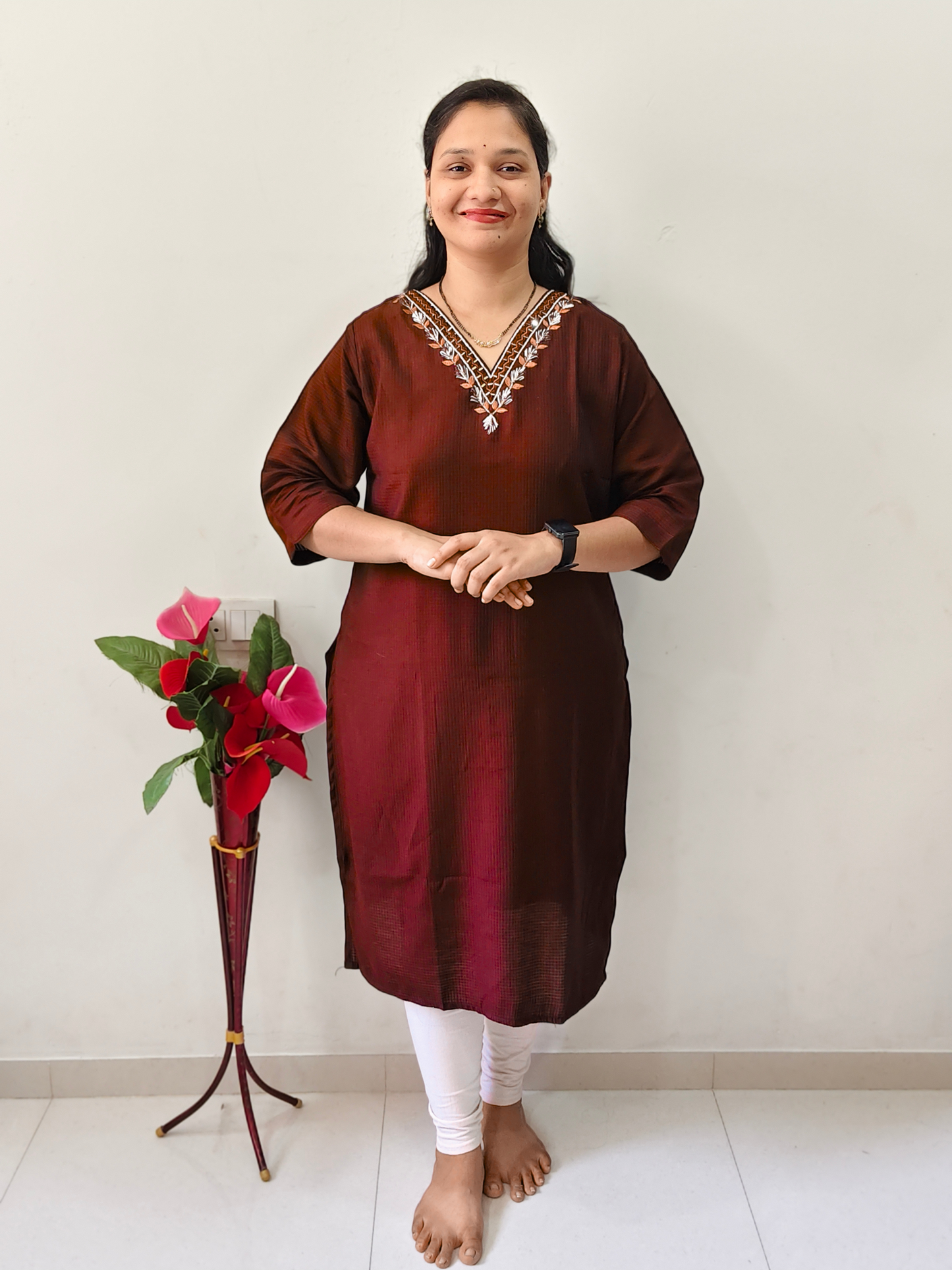 Elegant Collections V-Neck Designer Kurti in maroon with intricate embroidery for stylish casual wear