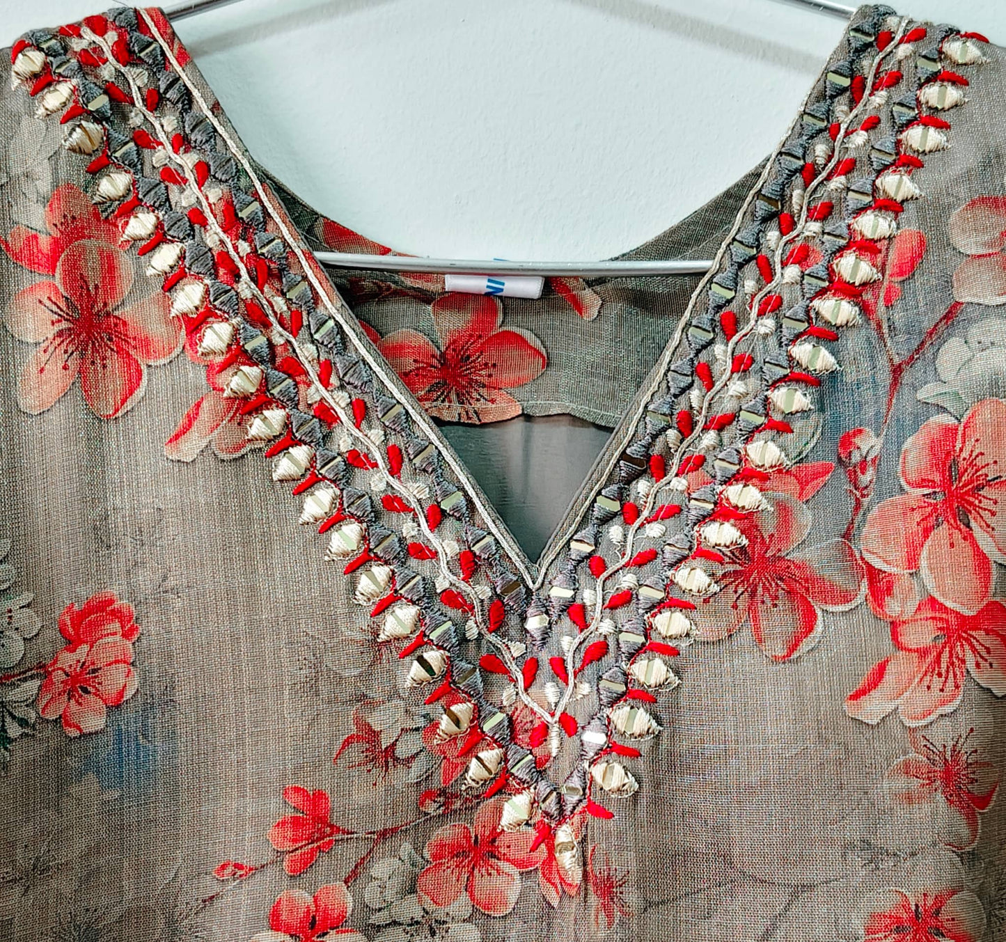 V-Neck Mirror Work Kurti with Floral Embroidery and Elegant Stitching Details