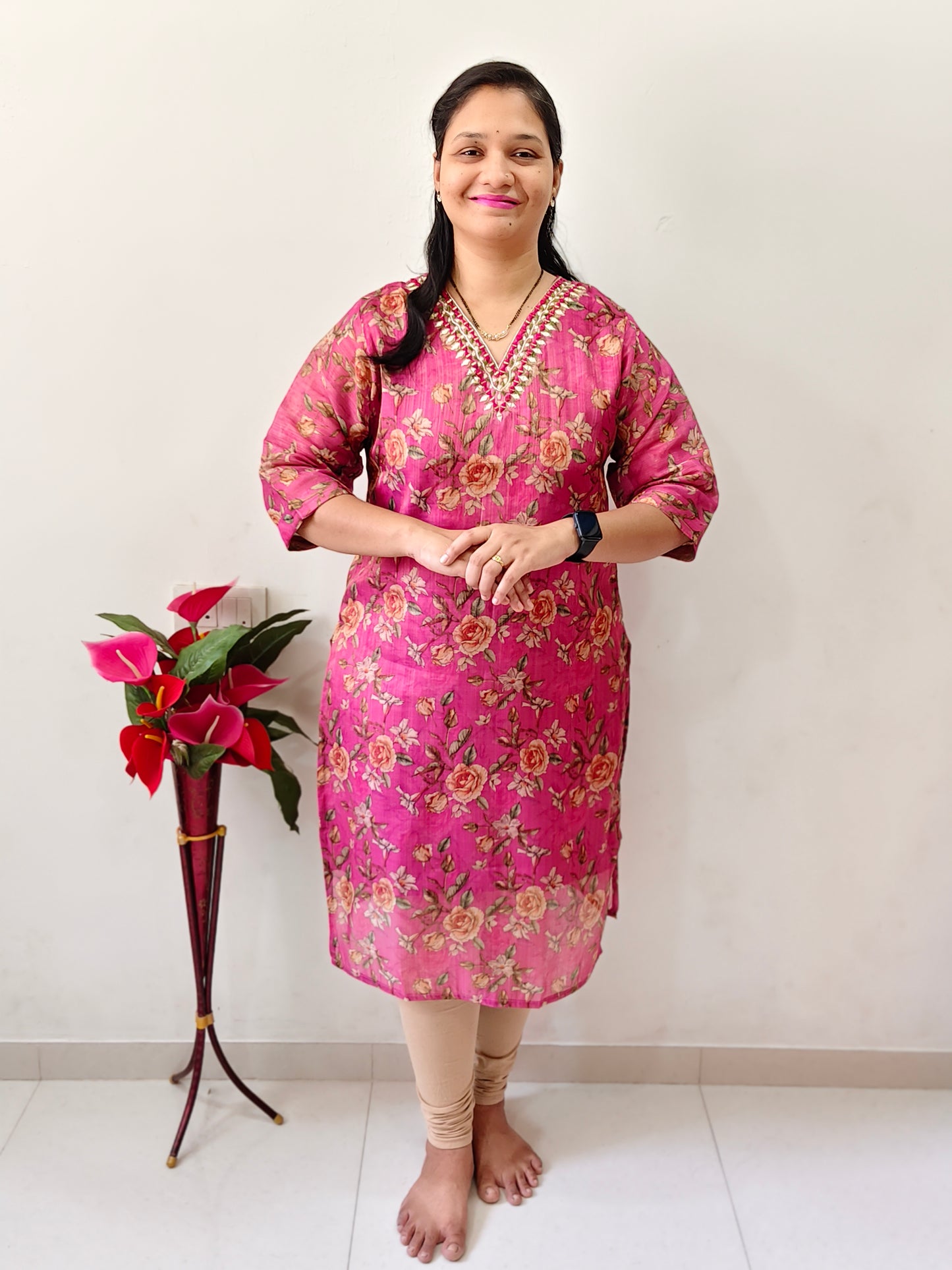 Elegant Collections V-neck mirror work kurti in pink floral design with three-quarter sleeves