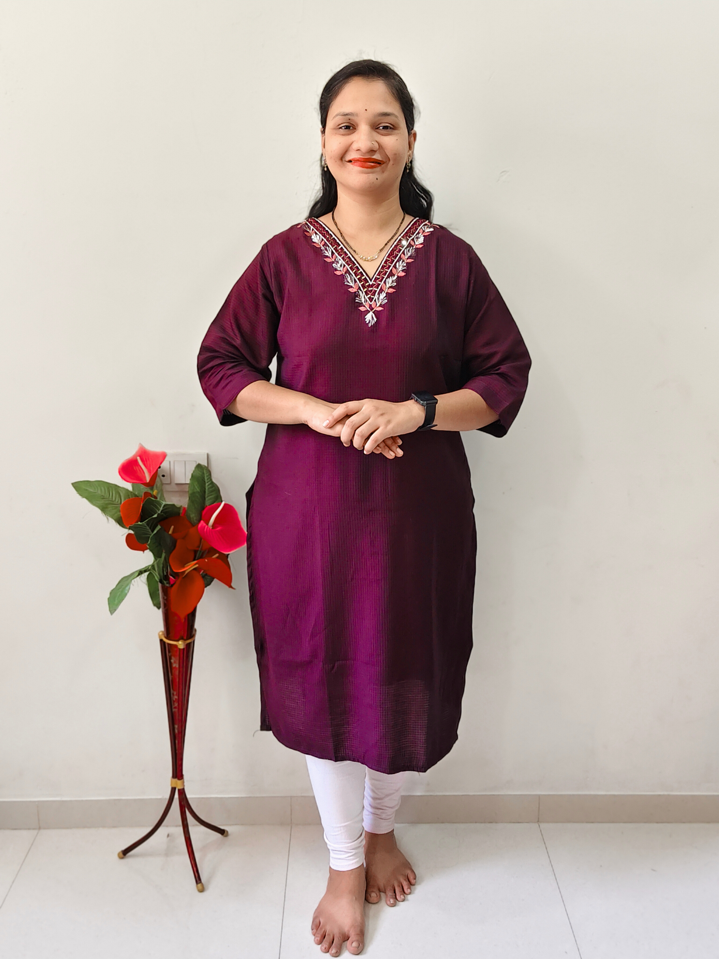 Elegant Collections designer V-neck kurti in dark purple with embroidered neckline, perfect for casual outings