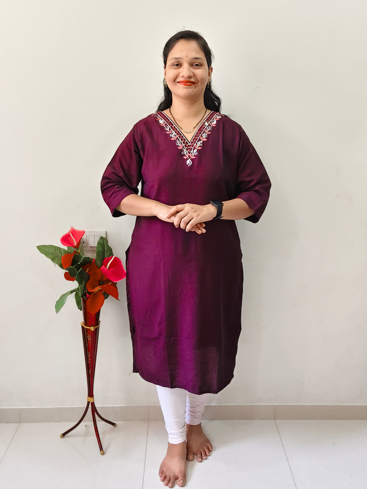 Elegant Collections designer V-neck kurti in dark purple with embroidered neckline, perfect for casual outings