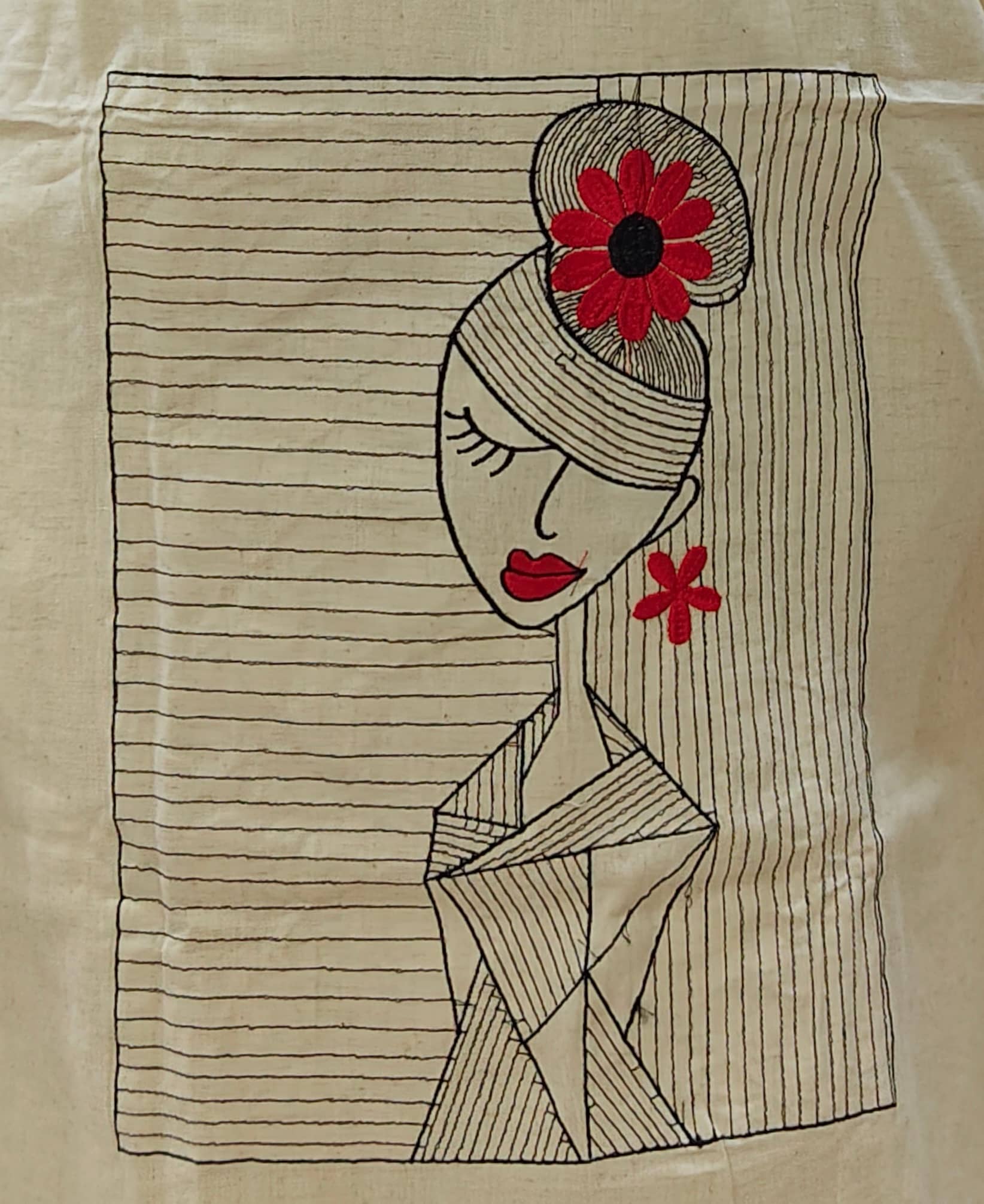 Khadi co-ord set with embroidery work featuring a stylish embroidered design of a woman