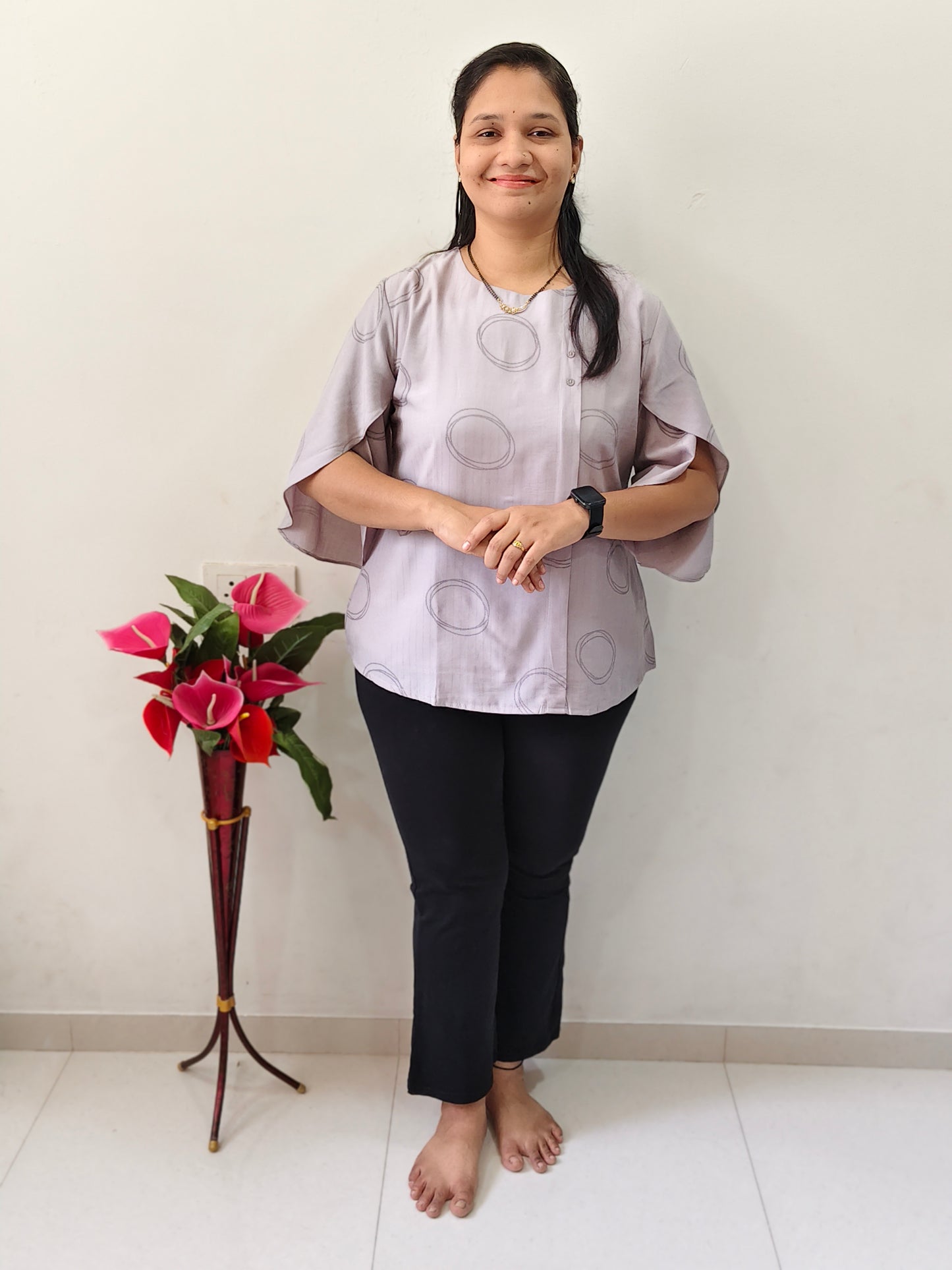 Elegant light grey silk short top with stylish bell sleeves, perfect for casual outings