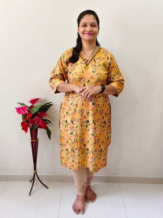 Elegant mustard yellow mirror work kurti with intricate designs for stylish casual wear