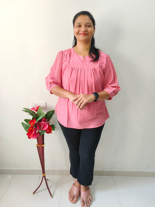 Elegant Collections onion pink short kurti with floral embroidery and relaxed fit for casual wear
