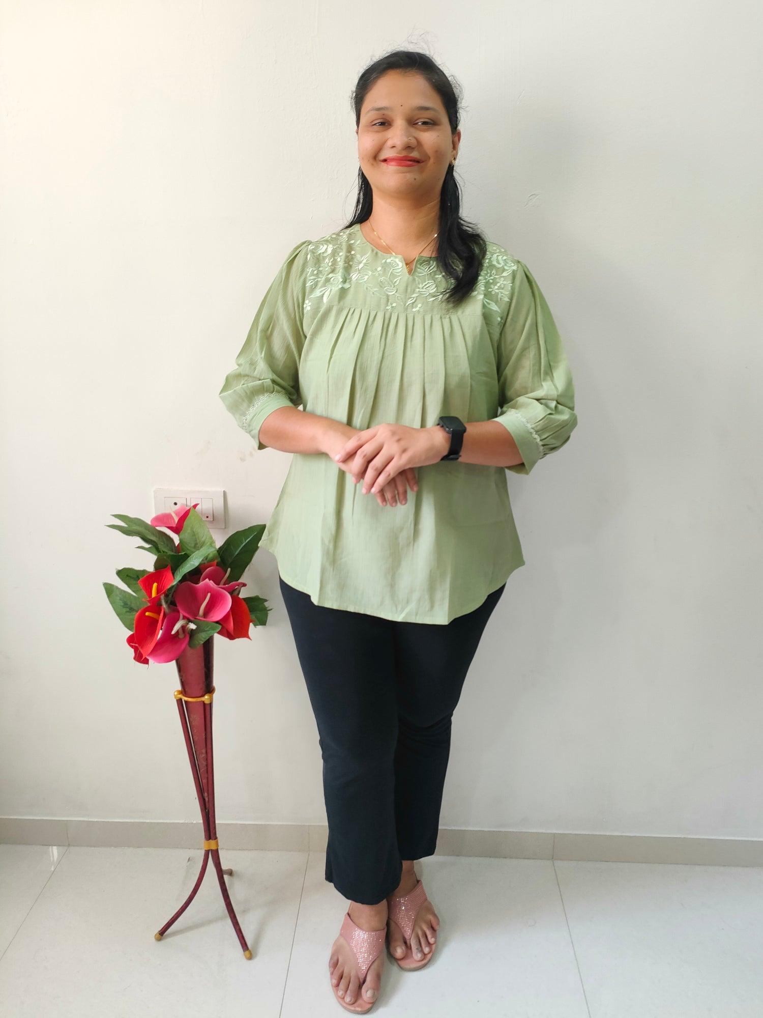 Pista short kurtis with embroidered neckline, perfect for casual and festive occasions.