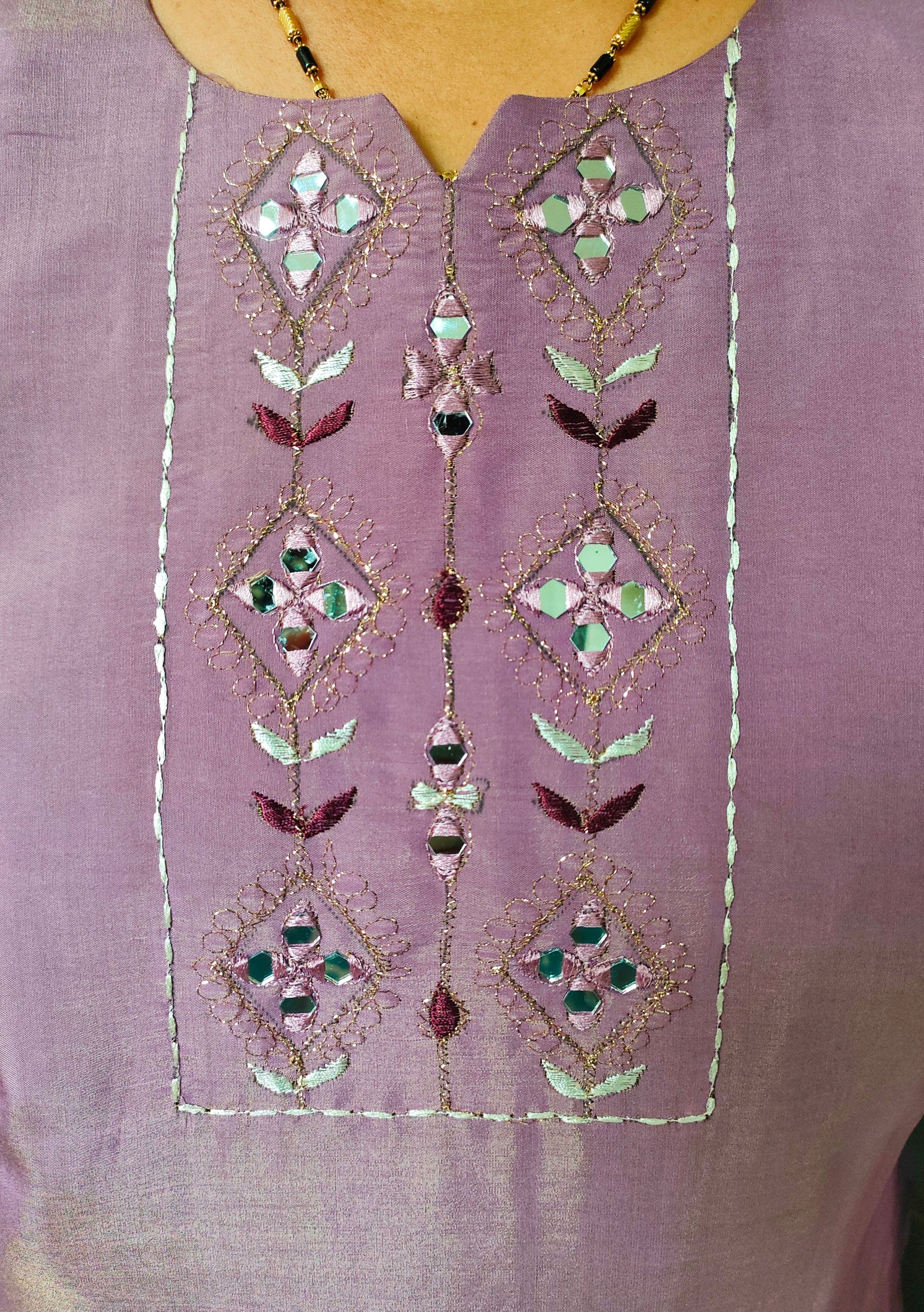 Elegant Plus Size Cotton Silk Kurti with Intricate Embroidery and Decorative Elements