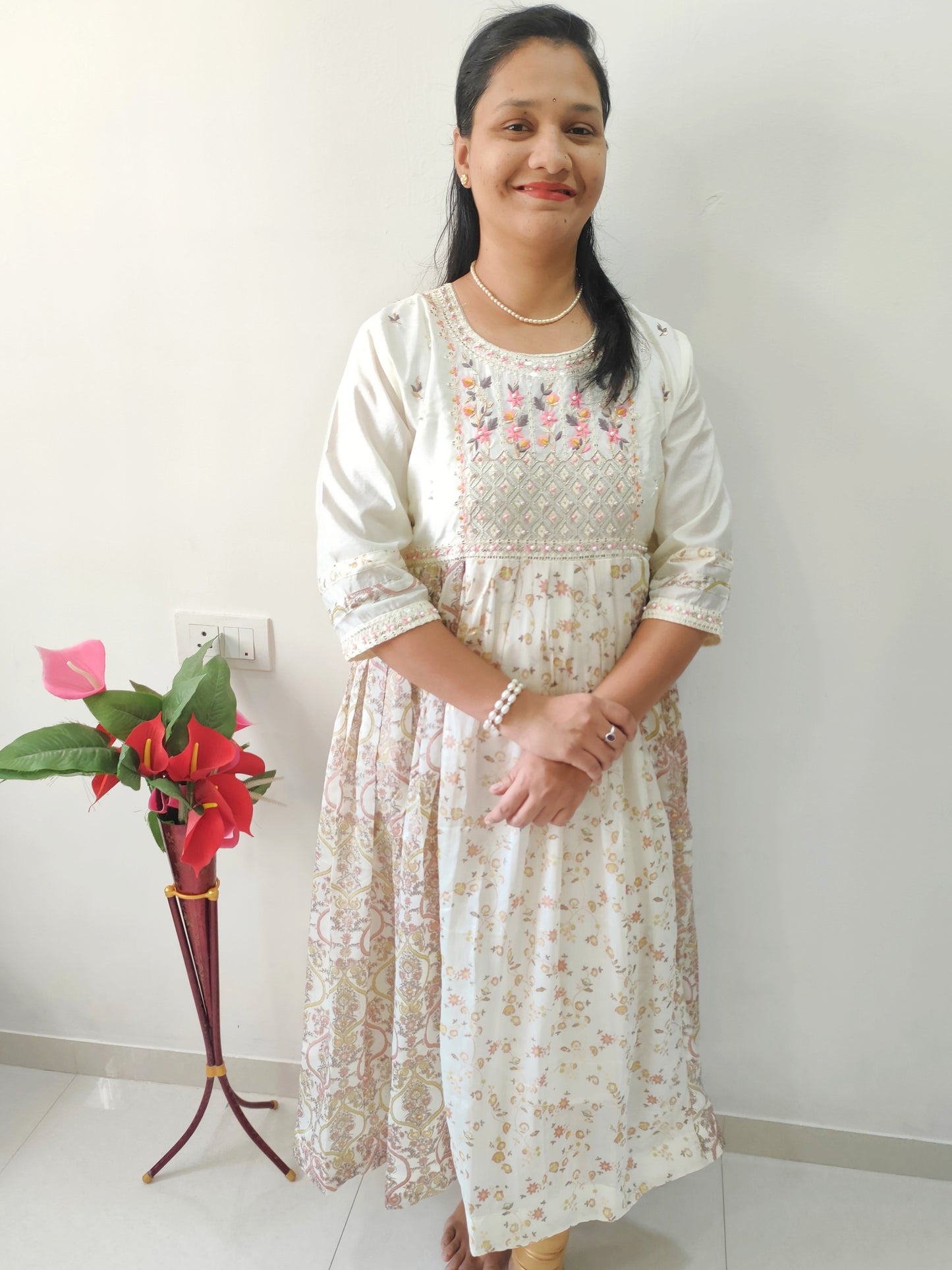 Elegant plus size umbrella gown with floral print and intricate embroidery details