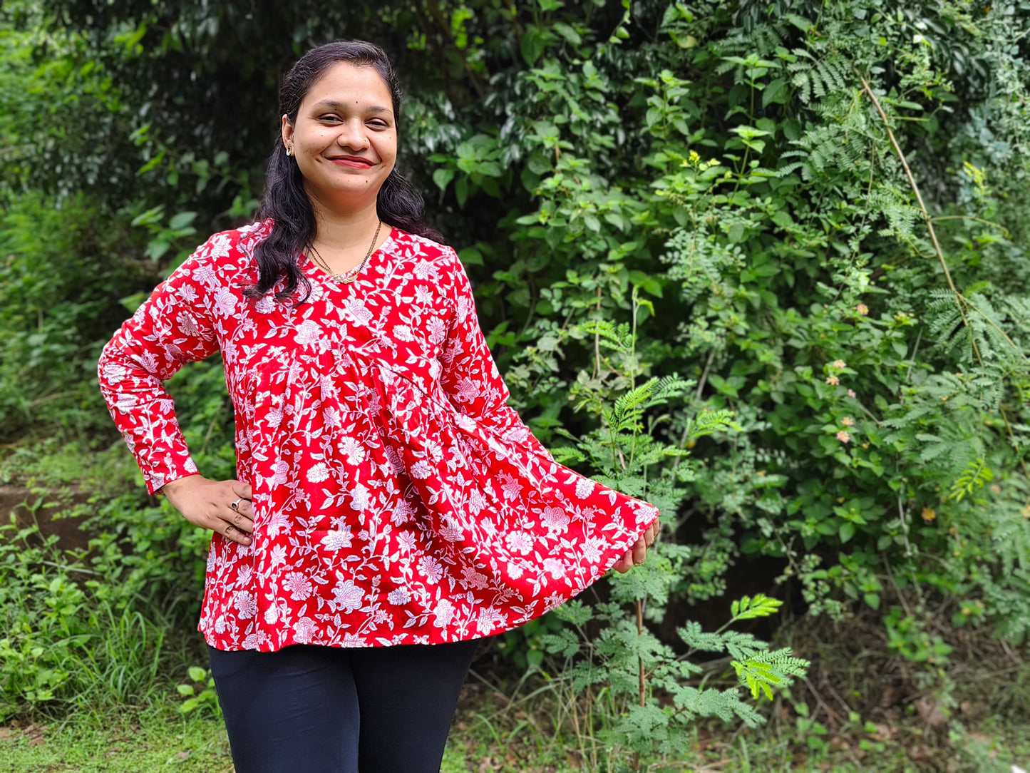Elegant Collections red peplum top for women with floral pattern, perfect for casual outings